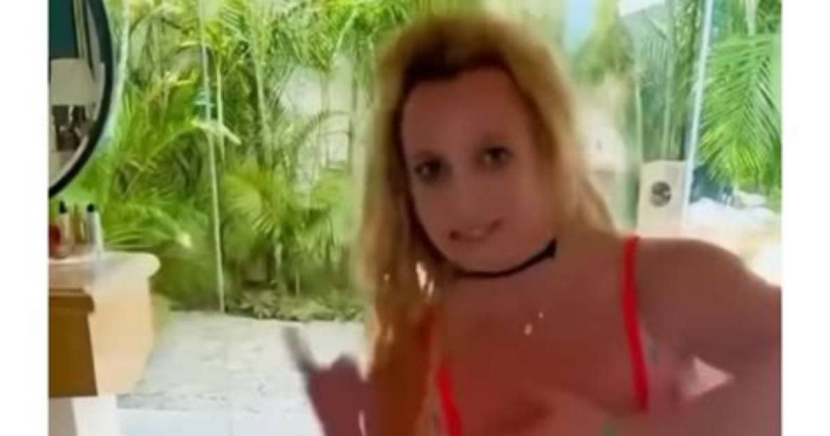 Britney Spears Dances Around in Very Skimpy Bikini as She Covers Her Body in Henna Tattoos