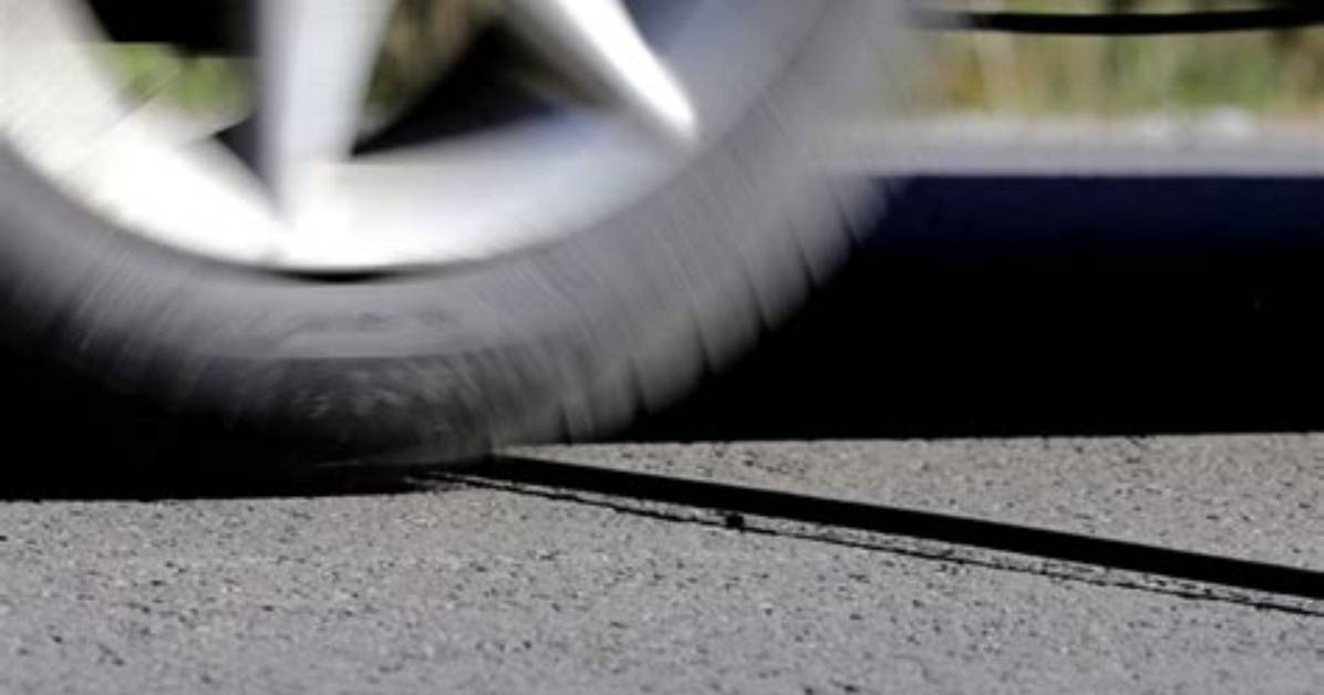 Here’s What Those Mysterious Black Cables on the Road Mean