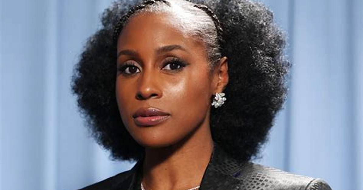 Issa Rae's Wedding Day Beauty Looks Includes a Butt-Length Curly Red Ponytail