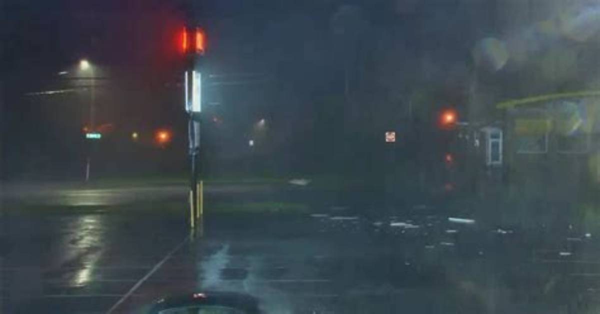 Sign Explodes from Hurricane Winds