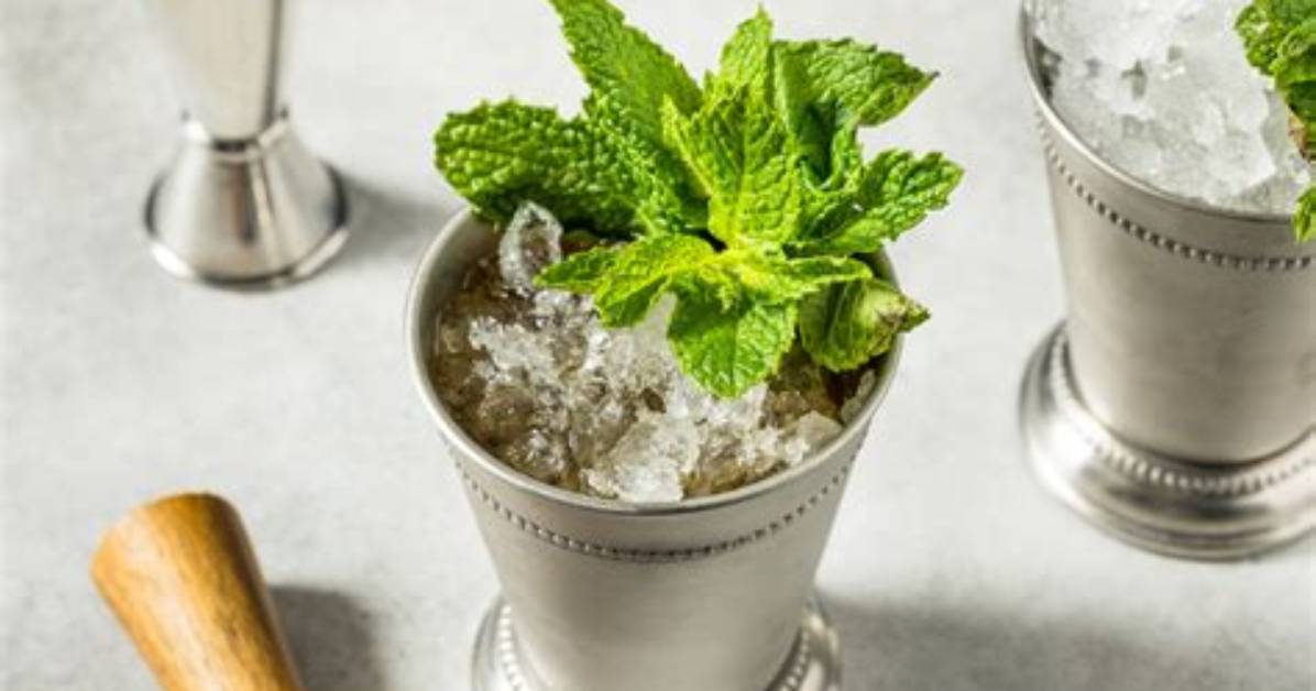 Why Are Mint Juleps Served in Silver Cups?