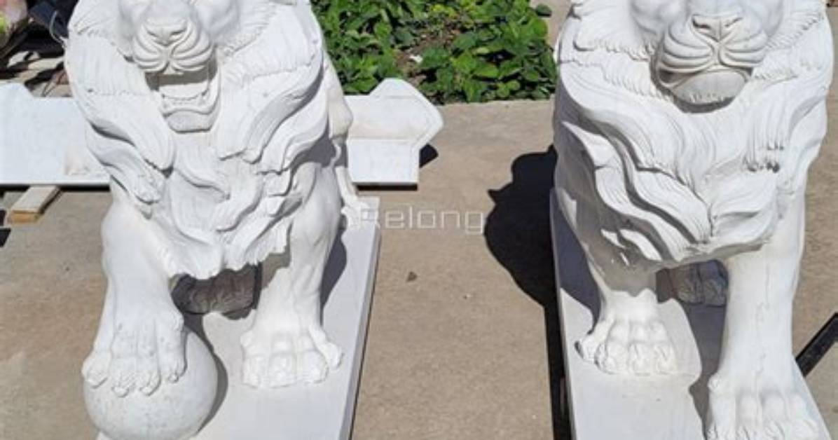 Why Do Lion Statues Have a Ball