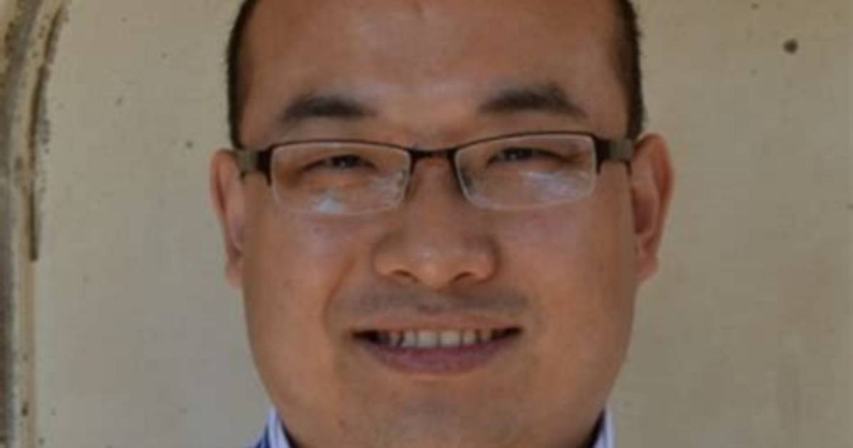 Zhiguo Zhou